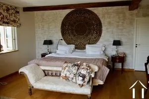 master bedroom with bathroom and dressing